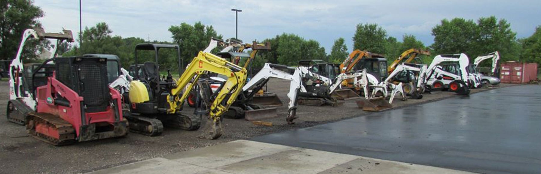 Parking lot filled with equipment from Woodhams Equipment